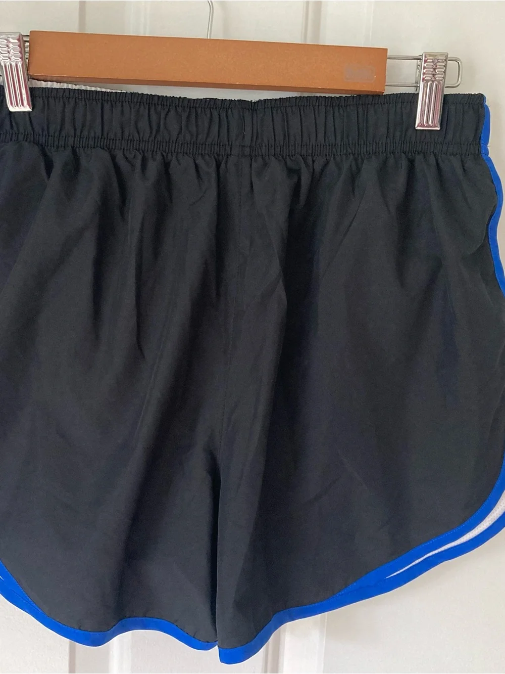 Nike Black Women's Athletic Shorts with Blue Trim
